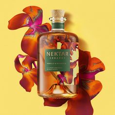 a bottle of nektar argance on a yellow background with red flowers