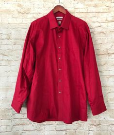 Van Heusen Men's Regular Fit Flex Collar Dress Shirt Red 18.5 34/35 55% cotton 45% polyester Great preowned condition. Pit to pit- 27” Shoulder to shoulder- 19.5” Shoulder to cuff- 24” Approx length- 33” Semi-formal Red Shirt With Spread Collar, Red Spread Collar Shirt For Semi-formal Occasions, Red Semi-formal Shirt With Spread Collar, Semi-formal Red Cotton Top, Red Cotton Semi-formal Top, Red Semi-formal Cotton Top, Red Semi-formal Top, Red Long Sleeve Tops For Semi-formal Occasions, Red Button-up Dress Shirt For Semi-formal Occasions