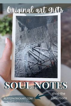 a person holding up an old photo with the words soul notes on it