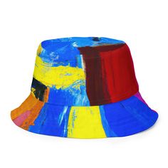 Reversible Bucket Hat, Blue Red Yellow Multicolor Abstract Pattern. This reversible bucket hat can be worn on both sides, making it easy to match with different outfits. Made of breathable premium fabric, this hat will become your go-to streetwear accessory. • 100% polyester • Fabric weight: 8.1 oz/yd² (275 g/m²) • Moisture-wicking and breathable fabric • Linen feel material • Reversible • Available in 2 sizes • Blank product components sourced from China Casual Multicolor Reversible Bucket Hat, Summer Multicolor Reversible Bucket Hat, Fun Reversible Bucket Hat, Reversible Multicolor Bucket Hat, Adjustable Blue 5-panel Bucket Hat, Mens Bucket Hats, Reversible Bucket Hat, Streetwear Accessories, Trendy Hat