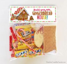 an assortment of candy and crackers in a bag with a gingerbread house sticker