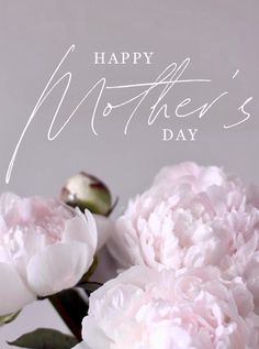 some pink flowers are in a vase with the words happy mother's day on it