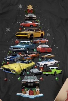 a christmas tree made out of cars and presents in front of a black t - shirt