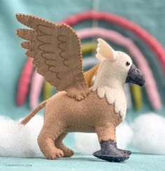 a toy bird with wings on its back