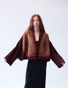 Burgundy shantung evening jacket with floral motif and applique by Romeo Gigli from his famous SS 1990 collection. Open front with wide cuffed sleeves. 88% silk 12% cotton.  - Will work for a range of sizes - Labeled 40  Shoulder: 23.5"  Bust: 71"  Waist: 86"  Length: 19"  Sleeve Length:  19"  Armscye: 18"  Condition: Excellent! Romeo Gigli 1990, Embroidered Silk Evening Outerwear, Vintage Silk Outerwear, Embroidered Long Sleeve Silk Outerwear, Spring Silk Outerwear With Kimono Sleeves, Silk Outerwear With Kimono Sleeves For Spring, Vintage Silk Outerwear For Spring, Spring Vintage Silk Outerwear, Romeo Gigli