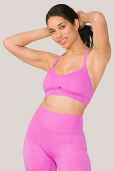 Alala women's Barre cami seamless bra in dark pink Pink Yoga Bra With Medium Bust Support, Supportive Sports Bra In Pink, Pink Stretch Sports Bra With Adjustable Straps, Pink Athleisure Bra With Light Support, Pink Stretch Athleisure Bra, Pink Stretch Yoga Bra, Pink Athleisure Sports Bra With Adjustable Straps, Athleisure Stretch Pink Bra, Athleisure Pink Bra