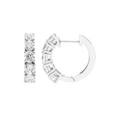 Make any outfit shine with these gorgeous 14k gold IGL certified 1 carat T.W. diamond hoop earrings from The Regal Collection. Make any outfit shine with these gorgeous 14k gold IGL certified 1 carat T.W. diamond hoop earrings from The Regal Collection. Diameter: 0.75 in. Metal: 14k gold Plating: rhodium Finish: polished Packaging: boxed Backings: click-itDIAMOND DETAILS IGL certified Total weight: 1 ct. Shape: round Color grade: H Clarity: I1 Setting: prong Diamond weights are approximate. Diam Timeless Brilliant Cut White Gold Hoop Earrings, Timeless White Gold Hoop Earrings With Brilliant Cut, Platinum Hoop Earrings With Brilliant Cut, Classic Platinum Hoop Earrings With Single Cut Diamonds, Classic Round Cut Hoop Earrings With Single Cut Diamonds, Timeless Round Cut Hoop Earrings For Anniversary, Fine Jewelry Round Cut Hoop Earrings With Prong Setting, Classic Small Hoop Brilliant Cut Diamond Earrings, Everyday Luxury Diamond White Brilliant Cut Hoop Earrings