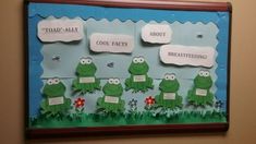 a bulletin board with paper cut out of the faces of froggy and toad - ally