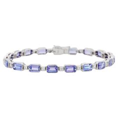 Tanzanite and Diamond bracelet in 18K Gold. It has a perfect octagon cut gemstone to make you stand out on any occasion or an event. A tennis bracelet is an essential piece of jewelry when it comes to your wedding day. The sleek and elegant style complements the attire beautifully, whether it's the bride wearing it herself, or as a gift to her bridesmaids to wear on the D’day. Bracelets are worn to enhance the look. Women love to look good. It is common to see a woman rocking a lovely gold brace Gold Braces, Tanzanite Bracelet, Bracelet Tennis, Tanzanite Stone, Gold Armband, Tanzanite Diamond, Tennis Bracelet Diamond, D Day, Diamond Sizes