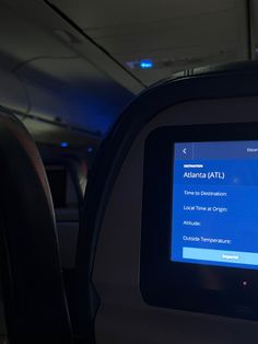 the screen on an airplane's entertainment system is clearly visible for us to see