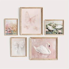 four framed paintings on the wall with flowers and a white swan in front of them