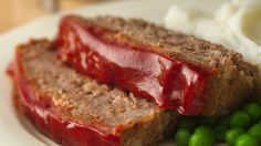 meatloaf, mashed potatoes and peas on a plate