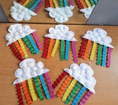 rainbows and clouds made out of popsicle sticks