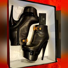 Stunning Authentic Versace Black Leather Booties!! Gold Plated Medusa, Great Condition, As Seen In Many Celebrities, Dust Bag Included And Box. 7 Inch Heel. Hard To Find, Iconic Versace Platforms!! Luxury Ankle Platform Heeled Boots, Luxury Platform Ankle Heeled Boots, Elegant Platform Heeled Boots For Office, Luxury Heeled Boots With Leather Lining For Party, Party High Heel Boots With Leather Lining, Party High Heeled Boots With Leather Lining, Luxury Formal Boots With Platform, Elegant Platform Heeled Boots For Night Out, Elegant Formal Platform Heeled Boots