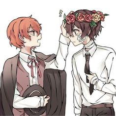 two people with flowers in their hair