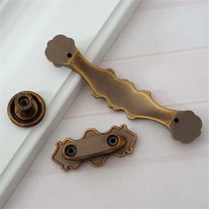 a door handle with two knobs on it