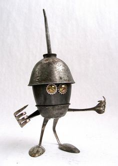 a metal robot with two eyes and one arm holding a wrench in his hand