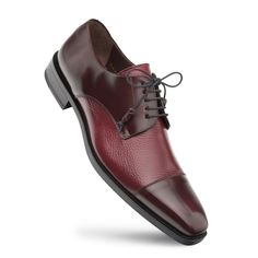 Style: Soka-Burgundy A stunning combination of Deerskin and Polished Calfskin accent this lace-up Blucher oxford from the Mezlan collection, featuring a cap-toe and a stitched, wheeled welt, and detailed with Polished Calfskin wrapped tassel ends! Handmade in Spain. Mezlan Shoes, Cordovan Shoes, Mens Overcoat, Cap Toe Shoes, Plaid And Leather, Luxury Designer Shoes, Mens Designer Shoes, Wingtip Oxford, Patent Shoes