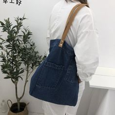 SPECIFICATIONS Handbags Type: Shoulder Bags Types of bags: Shoulder & Handbags Main Material: Denim Lining Material: None Shape: Casual Tote Place Of Origin: GUANG DONG Province Place Of Origin: GUANG DONG Province Origin: Mainland China CN: Guangdong Hardness: SOFT Pattern Type: Solid Interior: Cell Phone Pocket Decoration: NONE Exterior: Open Pocket Occasion: Versatile Closure Type: Hasp Gender: WOMEN Style: Casual Number of Handles/Straps: None update.24.02 [xlmodel]-[products]-[36431] [xlmod Denim Blue Large Capacity Double Handle Shoulder Bag, Denim Shoulder Bag With Large Capacity And Double Handle, Denim Shoulder Bag With Double Handle, Denim Double Handle Bag With Pockets, On-the-go Double Handle Denim Shoulder Bag, Denim Shoulder Bag, School Bookbags, Bag Jeans, Soft Pattern