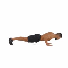 a man is doing push ups on his stomach with one leg up and the other hand behind him