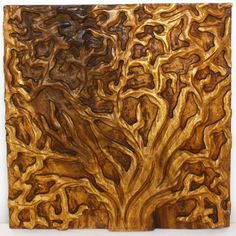 a piece of wood that has been carved into the shape of a tree with many branches