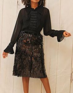 Black Fringe Skirt. Skirts are misses sizes S (6-8), M (8-10), L(10-12).