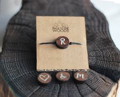 This personalized wooden bracelet with a walnut wood could be a perfect gift for you and your friend. On wooden circle is place for one character - please let us know your character when ordering in the notes to seller. Possible characters are letters, numbers, symbols, ... Walnut bracelet is placed on a black waxed cord with an adjustable tie knot so you don't need to worry about sizing. It's placed on a cardboard tray so it's ready for gifting. Adjustable Natural Wood Beaded Bracelets As Gift, Engraved Brown Bracelets As Gifts, Brown Engraved Bracelet For Gift, Engraved Brown Bracelet For Gift, Natural Wood Bracelet Jewelry Gift, Handmade Natural Wood Bracelets As Gift, Handmade Natural Wood Bracelets For Gift, Know Your Character, Puzzle Piece Necklace