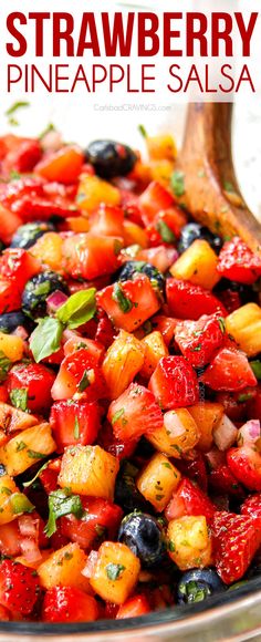 a close up of a bowl of fruit salad