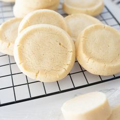 some cookies are cooling on a wire rack