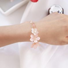 Pretty Flowers Bracelet PN3745 ●Material: Alloy ●Size: about 14 cm+6 cm extend chain ●About Shipping: We attach great importance to the orders of each customer and parcel delivery. 1.Processing time: 2-3 business days. 2.Shipping time: 10-15 business days to US, please allow 3-4 weeks shipping to other country.(Shipping times can be affected by variable customs clearance times or public holidays.) Flower Shaped Crystal Bracelet Gift, Dainty Flower-shaped Crystal Bracelet, Spring Rose Gold Flower Bracelets, Spring Rose Gold Flower Bracelet, Spring Wedding Metal Bracelets, Spring Metal Bracelets As Gift, Spring Flower-shaped Metal Bracelets, Spring Flower Metal Bracelets, Pink Bracelet With Extender