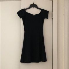 Off The Shoulder Black Stretch Skater Dress - Never Worn! Black Stretch Mini Dress With Short Sleeves, Black Stretch Mini Dress Casual, Chic Black Scoop Neck Dress, Black Scoop Neck Spring Dresses, Black Scoop Neck Dresses For Spring, Black Scoop Neck Dress For Spring, Black Scoop Neck Mini Dress, Black Fitted Scoop Neck Dress, Fitted Black Dress With Scoop Neck