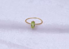 "Materials Gold, Rose gold, White gold Gemstone: Natural Peridot Peridot Ring / 14k Gold Peridot Wedding Ring / Anniversary Ring / Marquise Ring / Stacking Ring / Dainty Ring / Gemstone Ring / Prong set Item Details * Made to Order * Material: 14K Solid Gold (If 18K is needed, please inquire) * Gold Color Choice: Rose Gold, Yellow Gold, White Gold * Total CTW: .50 crt( 4 mm) (varies by size of the ring) * Width of Band: 1.30mm Ready to Ship in 7-10 Business Days * Also available in other gemston Stackable Peridot Wedding Jewelry, Wedding Stackable Peridot Rings, Yellow Gold Peridot Diamond Ring, Yellow Gold Peridot Stackable Rings For Wedding, Yellow Gold Peridot Stackable Rings For Anniversary, Oval Peridot Ring In Yellow Gold, Yellow Gold Peridot Solitaire Rings, Yellow Gold Solitaire Peridot Rings, Oval Peridot Jewelry For Wedding