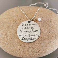 a necklace that says marriage made us family love made you my daughter