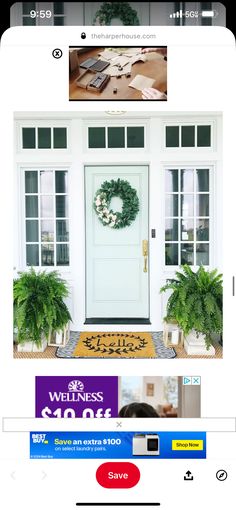 the front door is decorated with wreaths and potted plants for $ 50 off