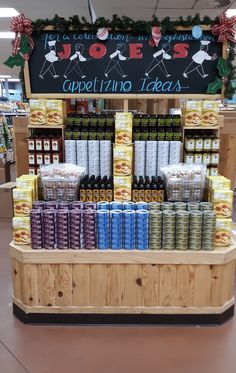 a display in a store filled with lots of different types of cans and tins