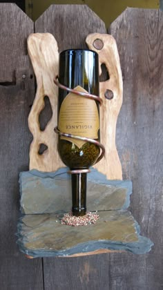 a wine bottle holder made out of wood