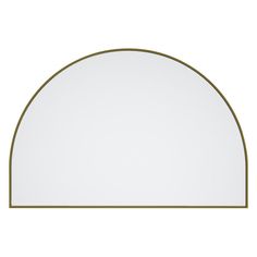 an arch shaped mirror with a gold frame on the top and bottom, against a white background