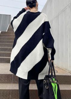 For Spring Black White Striped Knitted Clothes O Neck Plus Size Knit Tops Materials used:knit fabricMeasurement:One size fits all for this item. Please make sure your size doesn't exceed this size: BUST-130cm length 79cm / 30.81"bust 130cm / 50.7"Waist 130cm / 50.7"hem 120cm / 46.8" Oversized Black Crew Neck Cardigan, Oversized Black Knit Cardigan, Chic Black Knitted Cardigan, Black Knit Turtleneck Cardigan, Oversized Black Textured Knit Cardigan, Trendy Black Knit Cardigan, Black Acrylic Soft Knit Sweater, Black Acrylic Cardigan, Chic Black Crew Neck Cardigan