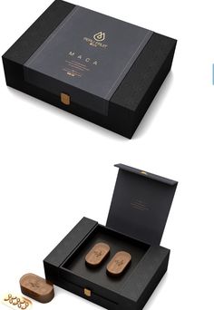 an open box with two pairs of shoes in it next to some gold rings on the floor