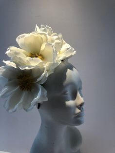 Magnolia- Off White Fascinator -Flower Fascinator- Tropical- Ivory Headband- Horse Race- Derby- Wedding- Garden Party- Polo Match- JazzAge- Billie Holiday Hello, This fascinator is a very popular headpiece and is made with several off white/ivory magnolia blossoms are 6 inches wide. It placed on magnolia leaves. It is attached to a satin covered skinny headband and is adjustable. It's very comfortable and will fit any size head. Has a yellow center. --------------------------------- Veil: You ca White Bridal Accessories For Spring, Cream Flower Hair Accessories With Handmade Flowers, Cream Hair Accessories With Handmade Flowers, White Hair Accessories For Formal Summer Events, Cream Flower Headband For Wedding, White Flower Headpiece For Garden Party, White Flower Headpieces For Garden Party, White Headband For Garden Party, White Spring Wedding Headband