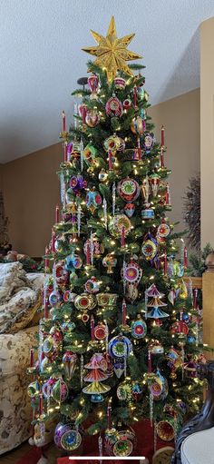 a christmas tree decorated with ornaments and lights