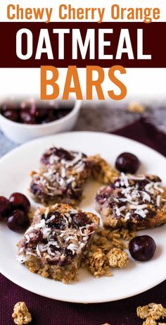 chewy cherry orange oatmeal bars on a white plate