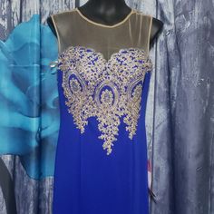 Blue Floor Length Formal Gown Embroidered Detail Padded Bust *Material Is Really Thick And Would Probably Be Better For Cooler Weather Blue Embroidered Floor-length Evening Dress, Embroidered Blue Floor-length Evening Dress, Royal Floor-length Evening Dress, Royal Blue Embroidered Dress For Party, Blue Embroidered Evening Dress For Party, Blue Festive Gown For Prom, Royal Embroidered Party Dress, Royal Ball Gown For Banquet, Festive Blue Prom Gown