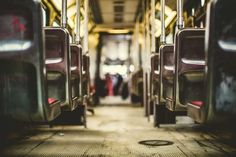 the inside of a public transit bus with its doors open