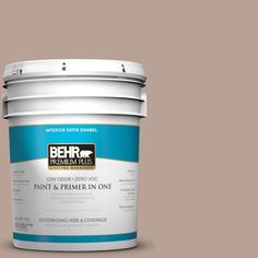 a bucket of behr premium ultra paint and primer in one