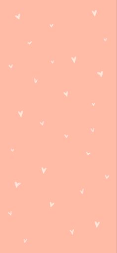 a pink background with small white hearts on it