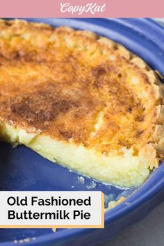 an old fashioned buttermilk pie on a blue plate with the words, old fashioned buttermilk pie