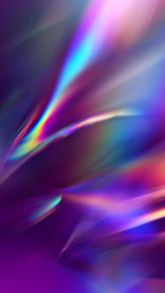 an abstract background with many colors and lines in the center, as well as blurry shapes