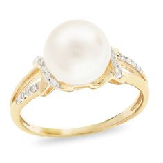 Inspire her with this simply stunning pearl and diamond ring. Crafted in 14K gold, this exquisite ring showcases a luminous 8.5-9.0mm cultured freshwater pearl flanked by swirling diamond-lined ribbons - atop a glistening split shank cleverly lined in sparkling petite diamonds. Shimmering with 1/15 ct. t.w. of diamonds and a bright polished shine, this beautiful look is destined to be admired. Diamond Ribbon, Cultured Pearl Bracelet, 10k Gold Ring, Split Shank Ring, Pearl And Diamond Ring, Ribbon Wrap, Right Hand Rings, Radiant Diamond, Pearl Types