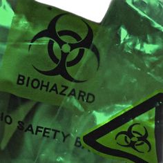 a biohazard hazard sign is shown on some plastic bags